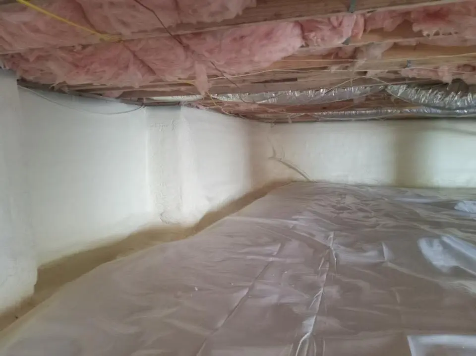 Crawl space encapsulation with closed-cell spray foam for Roof Leak Repair in Hiawatha